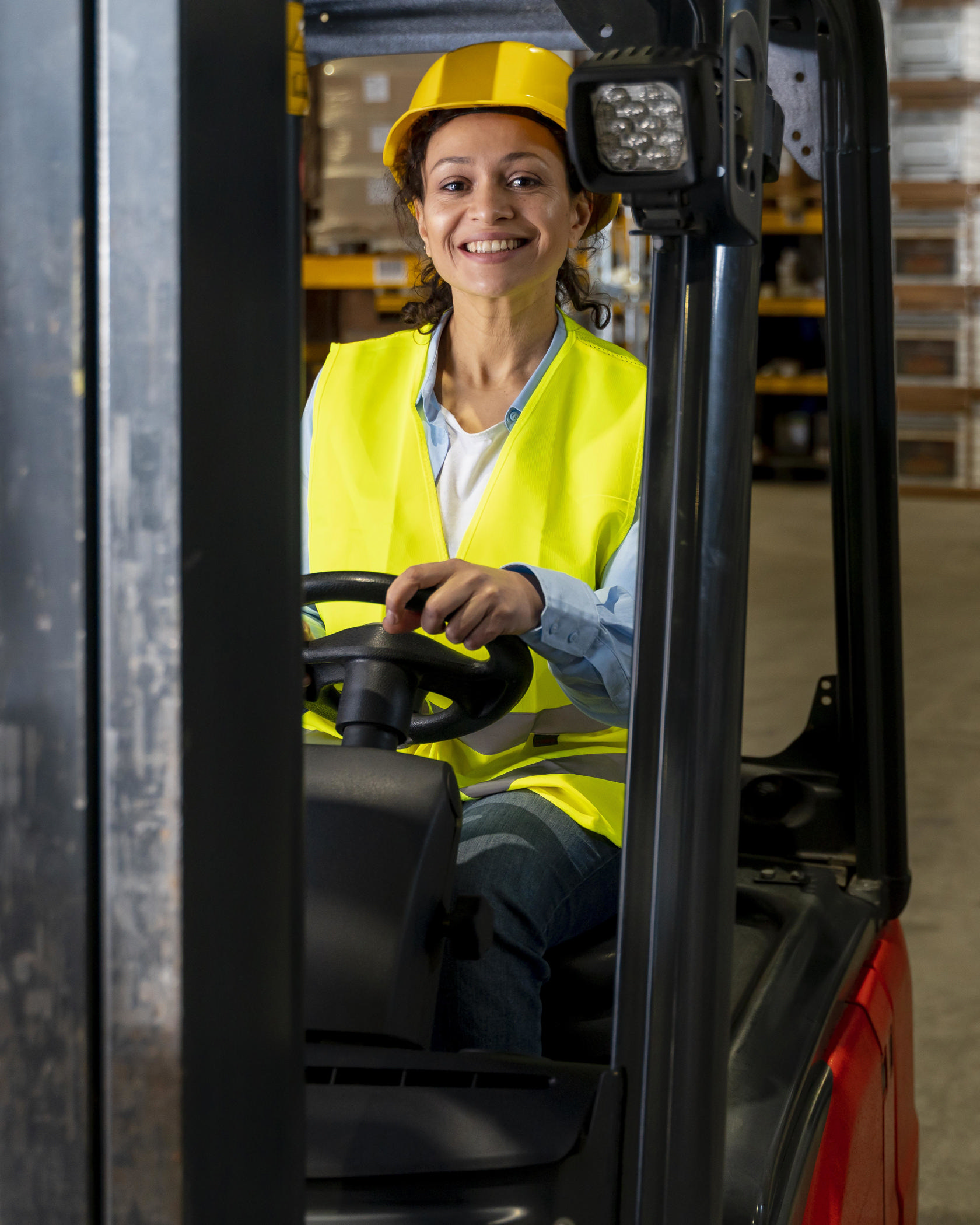 woman-driving-warehouse-loading-machine.jpg